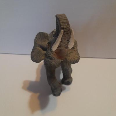 Collection of collectible Elephants with set of four black and white placemats
