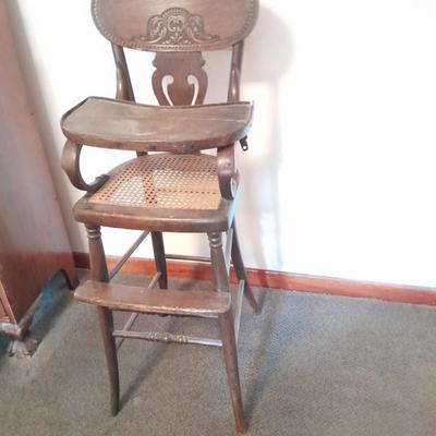 Antique cane seat Highchair with tray Very old!