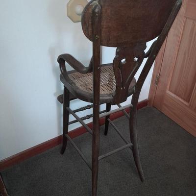 Antique cane seat Highchair with tray Very old!