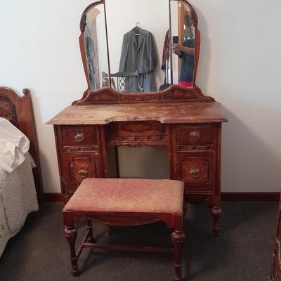 Antique wooden vanity with bench and mirror