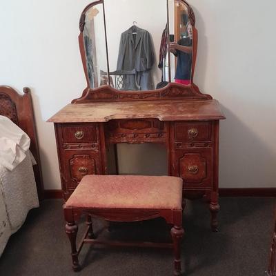 Antique wooden vanity with bench and mirror