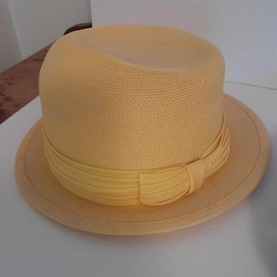 Two ladies' straw hats yellow hat is Union made