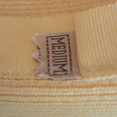 Two ladies' straw hats yellow hat is Union made