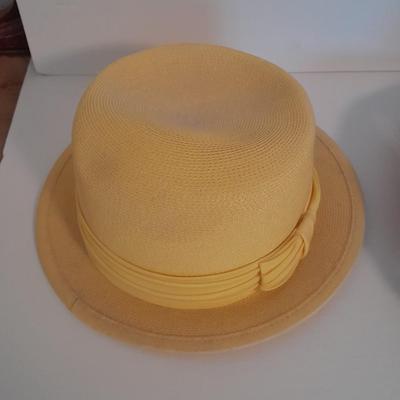 Two ladies' straw hats yellow hat is Union made