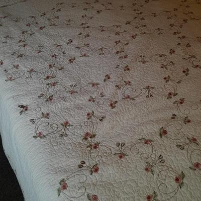 King sized embroidered rose quilted bedspread.