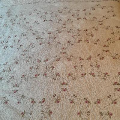 King sized embroidered rose quilted bedspread.
