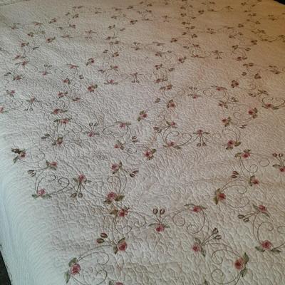 King sized embroidered rose quilted bedspread.