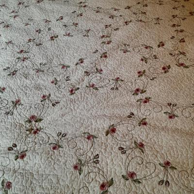 King sized embroidered rose quilted bedspread.