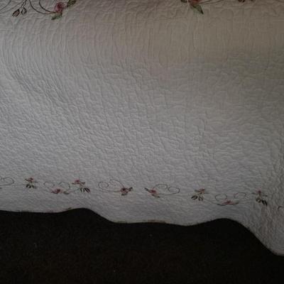 King sized embroidered rose quilted bedspread.