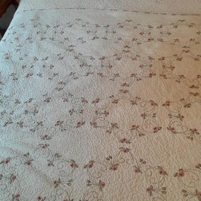 King sized embroidered rose quilted bedspread.