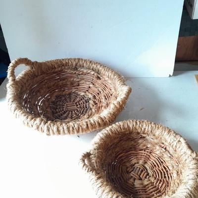 Two neat woven baskets