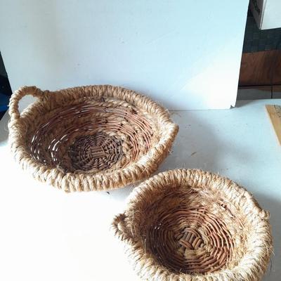 Two neat woven baskets