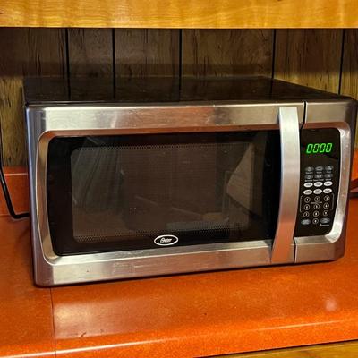 1100W Oster OGZF1301 Microwave (K-RG)