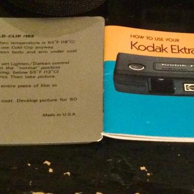 Polaroid land camera with paperwork