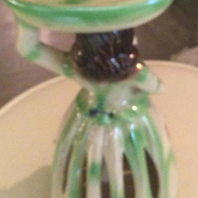 Green Napkin doll holding bowl