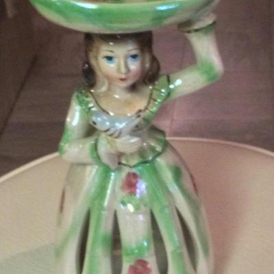 Green Napkin doll holding bowl