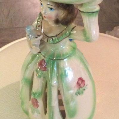 Green Napkin doll holding bowl