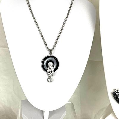 330 Black and Silver Necklaces and Earrings with Floral Clutch