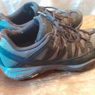 Two pair of Women's shoes Cannondale size 7 Merrell size 8