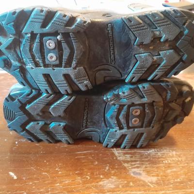 Two pair of Women's shoes Cannondale size 7 Merrell size 8