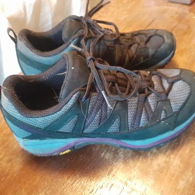 Two pair of Women's shoes Cannondale size 7 Merrell size 8