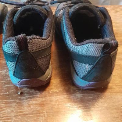 Two pair of Women's shoes Cannondale size 7 Merrell size 8