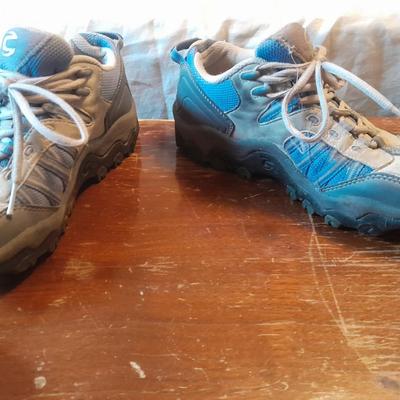 Two pair of Women's shoes Cannondale size 7 Merrell size 8