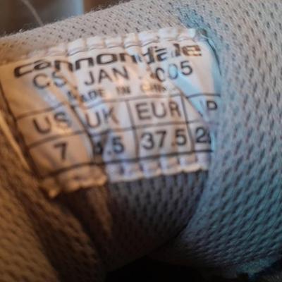 Two pair of Women's shoes Cannondale size 7 Merrell size 8