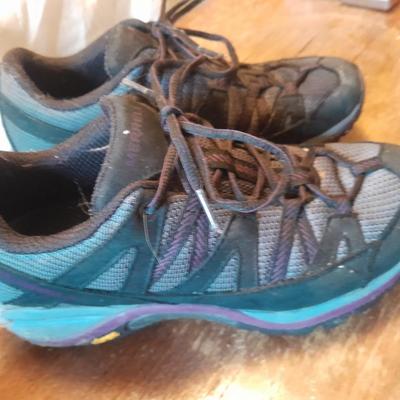 Two pair of Women's shoes Cannondale size 7 Merrell size 8