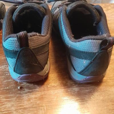 Two pair of Women's shoes Cannondale size 7 Merrell size 8