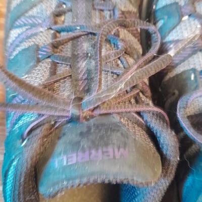 Two pair of Women's shoes Cannondale size 7 Merrell size 8
