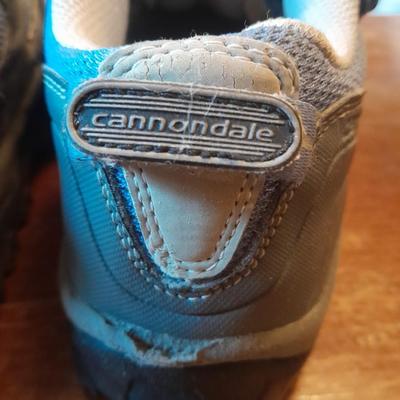 Two pair of Women's shoes Cannondale size 7 Merrell size 8