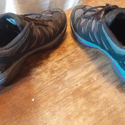 Two pair of Women's shoes Cannondale size 7 Merrell size 8