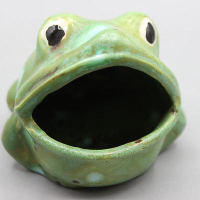 Frog spoon rest has a raised spotted green frog on aqua swirl glaze. It is  handmade ceramic in a round bowl shape with a notch to catch any gloop  keeping your stove