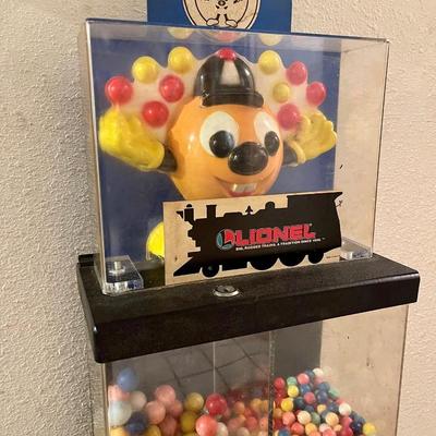 A double sided 25 cent gumball machine.