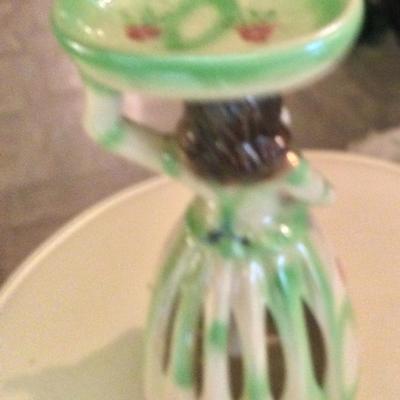 Green Napkin doll holding bowl