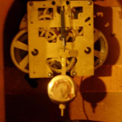 round wood mantle clock