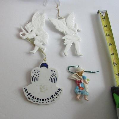 Lot 23: 4 Older Porcelain Angel Ornaments