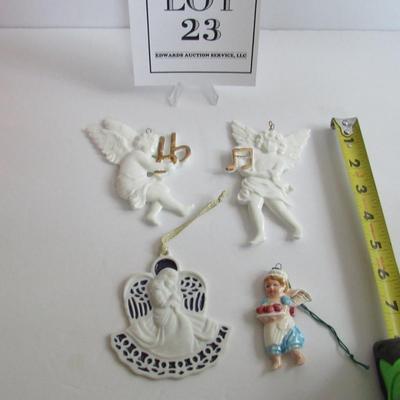 Lot 23: 4 Older Porcelain Angel Ornaments