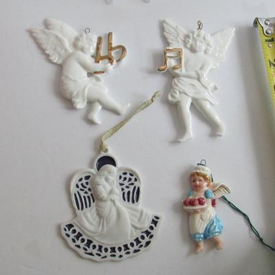 Lot 23: 4 Older Porcelain Angel Ornaments