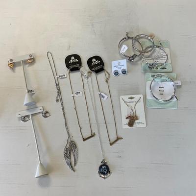 398 Religious Lot of Five Necklaces, Four Bracelets, Two Earrings
