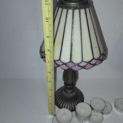 Two matching tea lamps with glass shades and tea candles