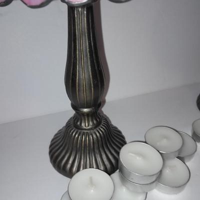Two matching tea lamps with glass shades and tea candles