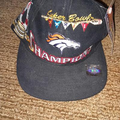 Denver Bronco's apparel new socks, Gloves, hat, T-shirt and a sticker