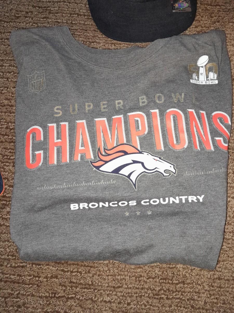 Denver Bronco's apparel new socks, Gloves, hat, T-shirt and a sticker