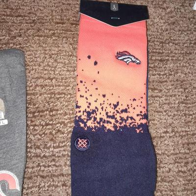 Denver Bronco's apparel new socks, Gloves, hat, T-shirt and a sticker