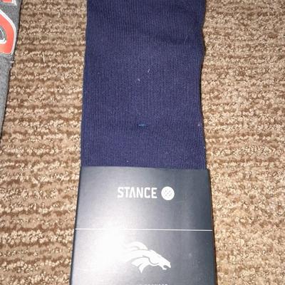 Denver Bronco's apparel new socks, Gloves, hat, T-shirt and a sticker