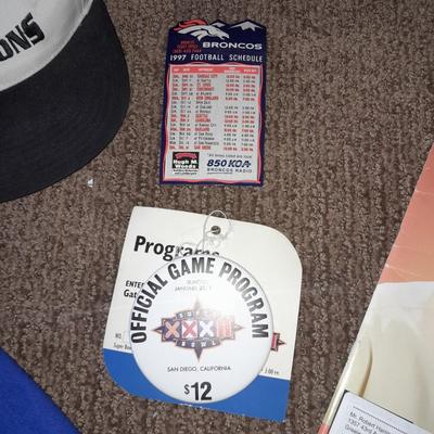 Bronco's collectible items from Superbowl and John Elway Seat cushion, Apron John Elway ticket stub