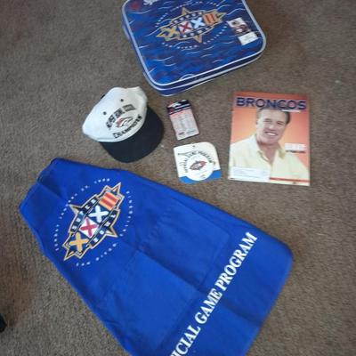 Bronco's collectible items from Superbowl and John Elway Seat cushion, Apron John Elway ticket stub