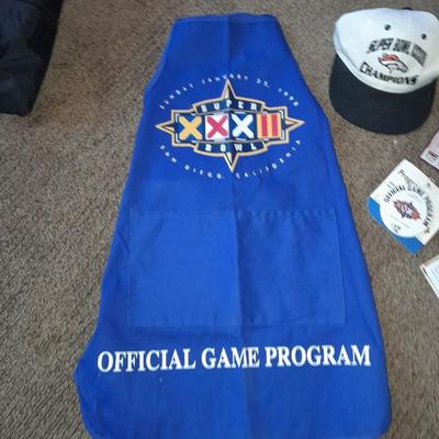 Bronco's collectible items from Superbowl and John Elway Seat cushion, Apron John Elway ticket stub